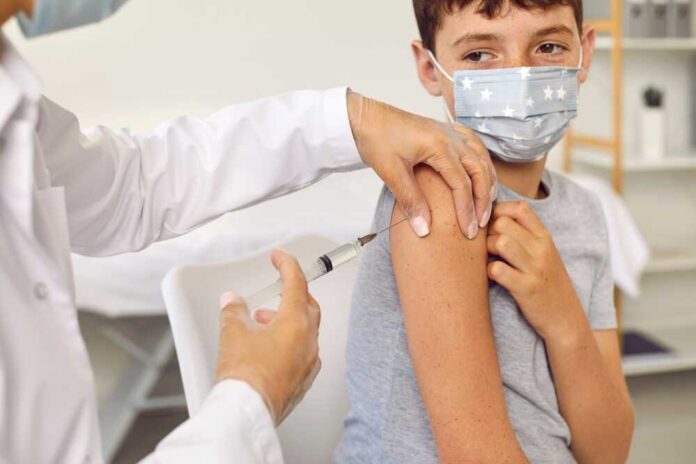 Children's,Vaccination.,Preteen,Brave,Boy,In,Hospital,Receives,Scheduled,Dose