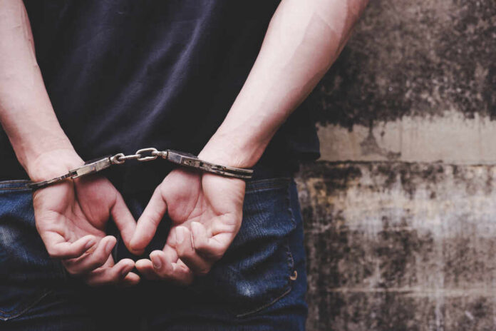 Thief,Under,Arrest,And,Get,Cuffed,By,Policeman,Bad,Person