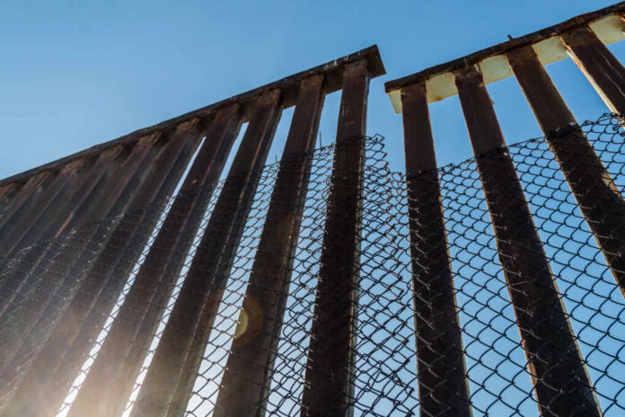 A,Section,Of,The,Border,Fence,Separating,San,Diego,,California