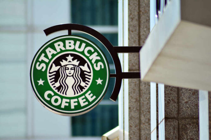 Warsaw,,Poland.,23,April,2018.,Sign,Starbucks,Coffee.,Company,Signboard