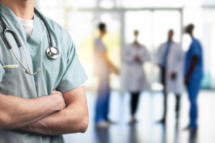 A,Close-up,Of,A,Healthcare,Professional,In,Scrubs,With,Arms