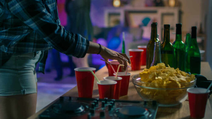 At,The,College,House,Party:,Girl,Takes,Glass,With,Drink