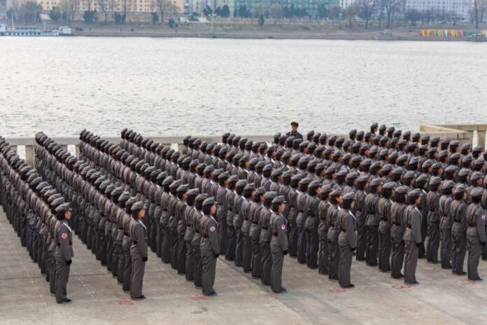 Pyongyang,,North,Korea,,March,26,,2008:,Juche,Tower,Esplanade,,Squad