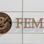 Signage of FEMA, U.S. Department of Homeland Security, displayed on a building