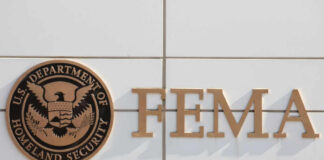 Signage of FEMA, U.S. Department of Homeland Security, displayed on a building
