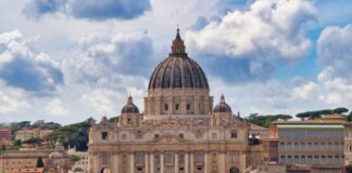 St. Peters Basilica in Vatican City under a cloudy sky