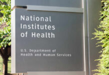 Sign for the National Institutes of Health displaying its affiliation with the U.S. Department of Health and Human Services