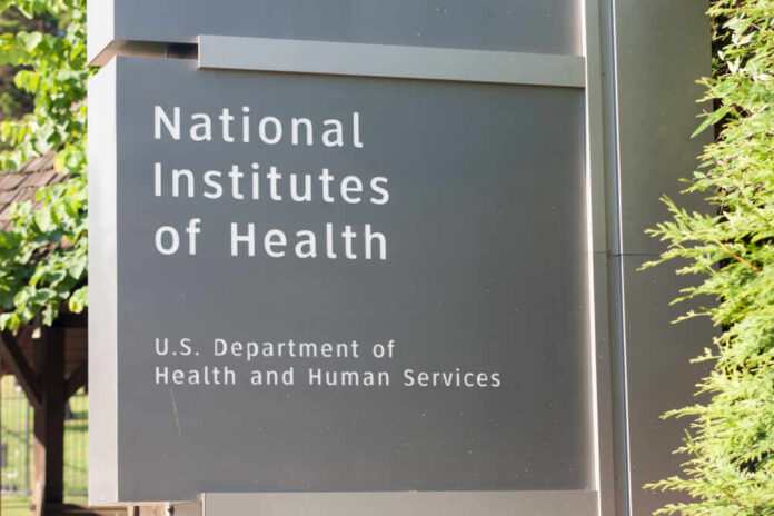 Sign for the National Institutes of Health displaying its affiliation with the U.S. Department of Health and Human Services