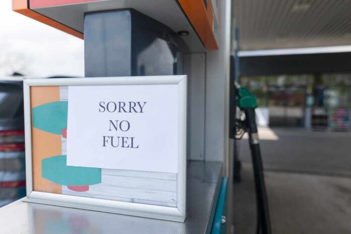 Sign at a gas station indicating no fuel available