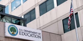 Exterior view of the U.S. Department of Education building with an American flag