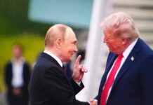 Two political leaders shaking hands during a meeting