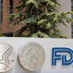 Signage featuring the FDA logo and symbols of health services