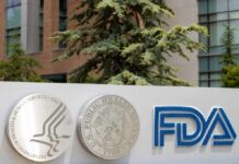 Signage featuring the FDA logo and symbols of health services