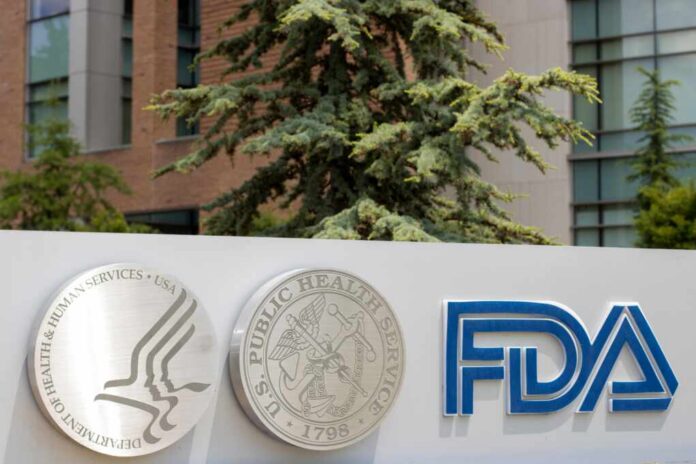 shutterstock_2186132811.jpg Signage featuring the FDA logo and symbols of health services