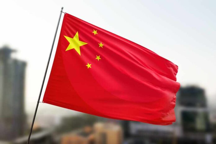 Waving flag of China with a star and four smaller stars