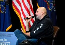 Speaker at a political event discussing issues with an audience