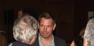 Group of people engaged in conversation at an event