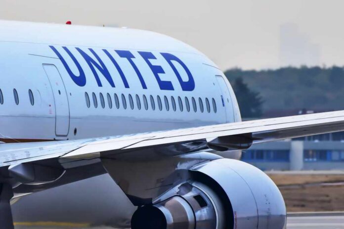 Close-up view of a United Airlines airplane wing and engine