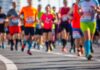 A group of runners participating in a marathon on a sunny day