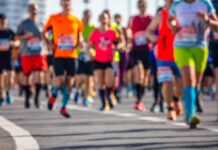 Blind Runner SHOCKS World With AI Marathon Feat A group of runners participating in a marathon on a sunny day