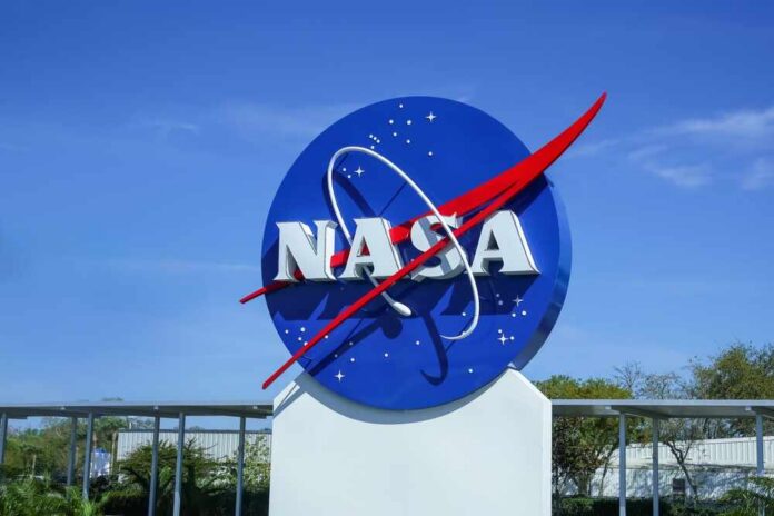 NASA logo displayed against a clear blue sky