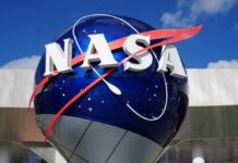 U.S. Space Dominance Under Siege — China Advances NASA logo displayed on a large blue globe against a clear sky