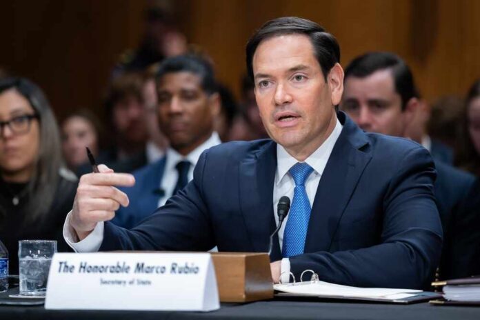 shutterstock_2630230667.jpg A public official speaking during a Senate hearing