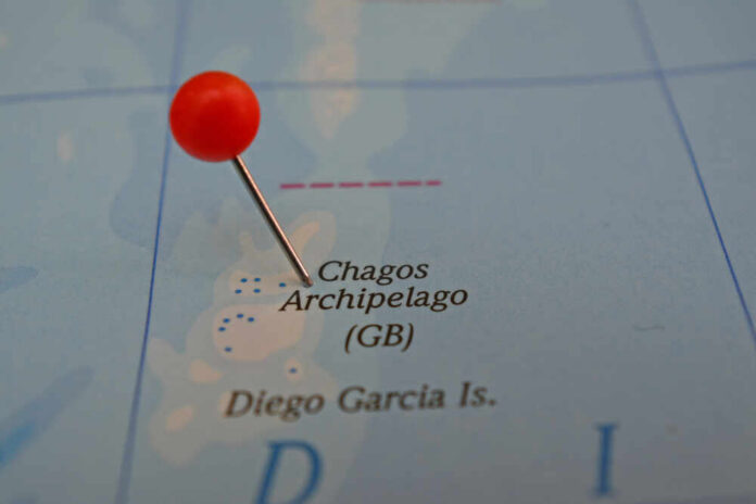 A map showing the Chagos Archipelago with a red pin marking the location