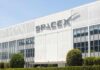 Shockwave: SpaceX IPO Hype Hits Wall Street Exterior view of the SpaceX building with a prominent logo