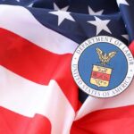 U.S. Department of Labor seal on an American flag