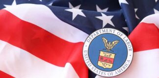 U.S. Department of Labor seal on an American flag