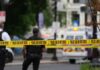 Infant Rescued from Floodwaters – Texas in Awe Police officers near a crime scene marked by caution tape