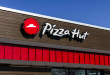 Pizza Hut storefront sign on a building exterior
