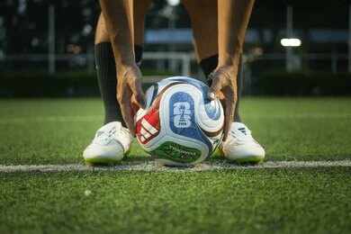 FIFA World Cup 26 poster with soccer ball in urban setting