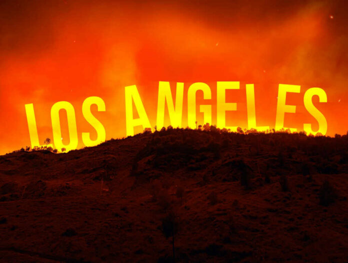 shutterstock2569141941jpg A dramatic landscape featuring the words Los Angeles against an orange sky, suggesting a fire or sunset.