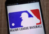 Missouri Threatens MLB Over Pride Push Major League Baseball logo displayed on a smartphone screen