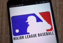 Missouri Threatens MLB Over Pride Push Major League Baseball logo displayed on a smartphone screen