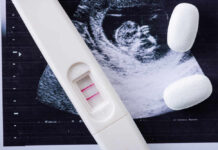 Safety Questions Follow Abortion Pill Boom Pregnancy test next to an ultrasound image and two white tablets