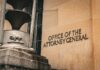 GOP Renegade Threatens Trump’s DOJ Pick Office of the Attorney General building facade with metal sculpture