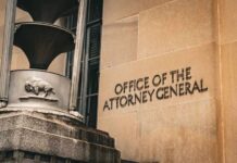 Office of the Attorney General building facade with metal sculpture