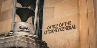 Office of the Attorney General building facade with metal sculpture