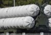 Quiet Missile Surge Locks In Mega Spending Close-up of a military missile system with cylindrical launchers
