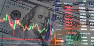 Overlay of stock market data on a background of hundred dollar bills