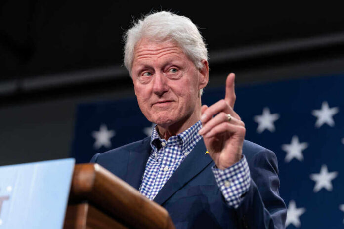 Former president gesturing while speaking at an event