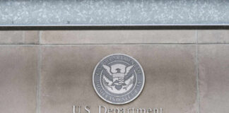 Questions Grow Over DHS Contracts Signage of the U.S. Department of Homeland Security with an official seal