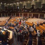 Ban or Bust? Dems Balk at Weak Fix Legislative chamber with members gathering on the floor