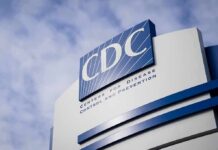 The Outbreak Few Expected To Return CDC headquarters sign against a cloudy sky