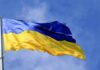 Britain Gives Ukraine A Powerful New Edge Ukrainian flag waving on a flagpole against blue sky