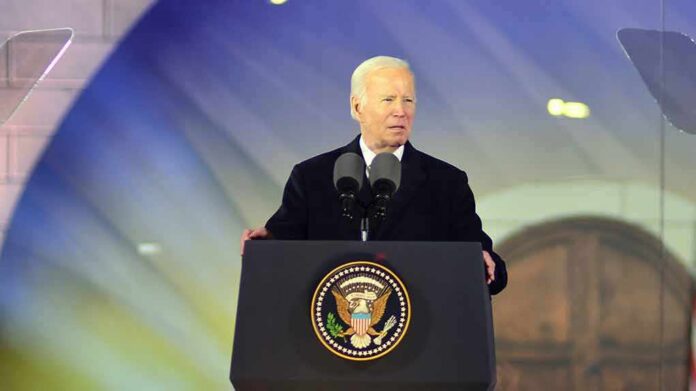 man at presidential podium delivering a speech