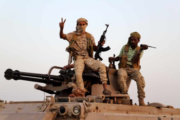 Hajjah,,Yemen,,March,12,,2021:,Violent,Battles,Between,Government F-35 military jets parked on an airfield with crew members nearby